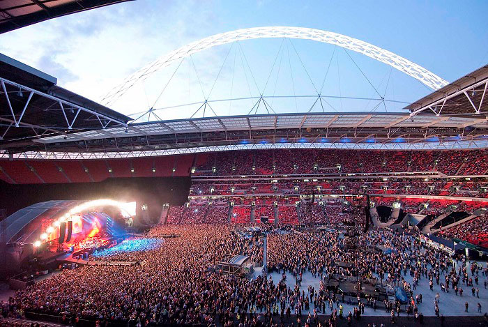 Packed crowd at concert in Wembley Stadium